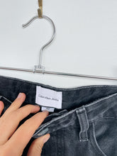 Load image into Gallery viewer, Calvin Klein Mini Skirt Black Denim (W29)
