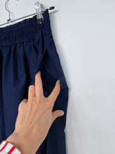 Load image into Gallery viewer, Uniqlo Broderie Skir Navy Midi (XS)
